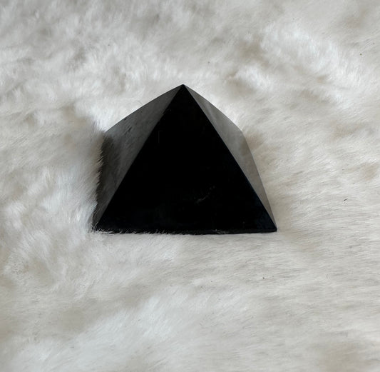Small black obsidian pyramid